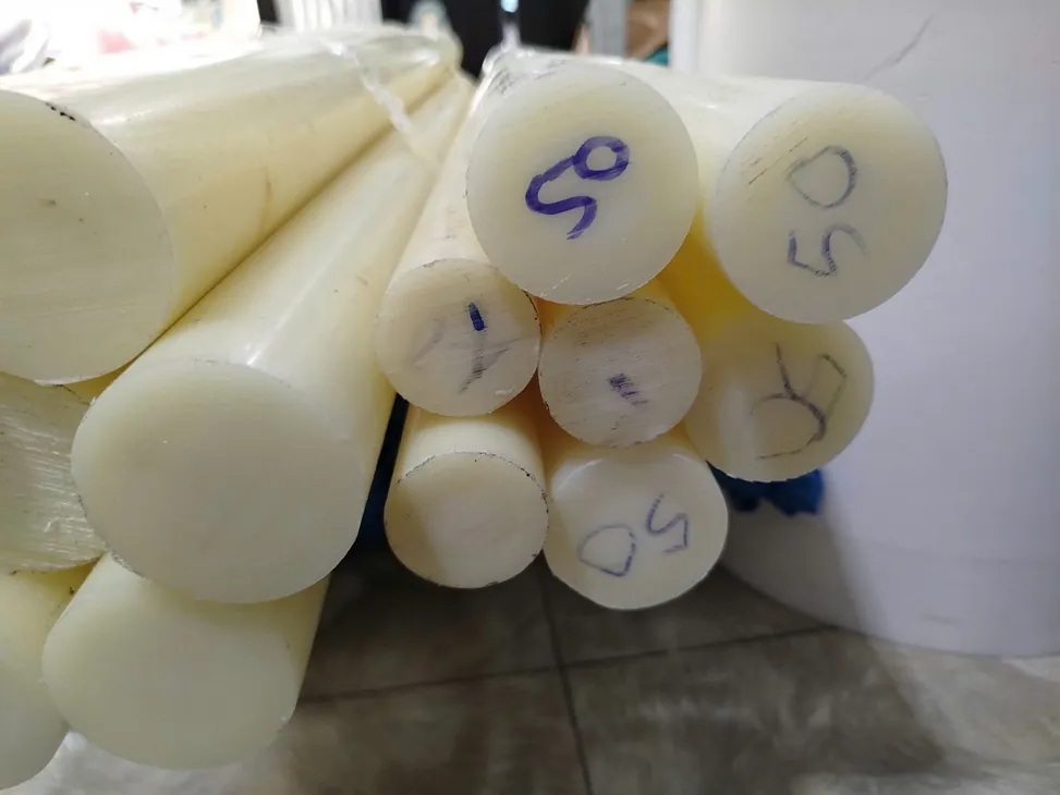 Nhựa PA cây tròn đặc phi 115 mm — phi 50 Nhựa PA cây tròn đặc phi 115 mm — phi 50