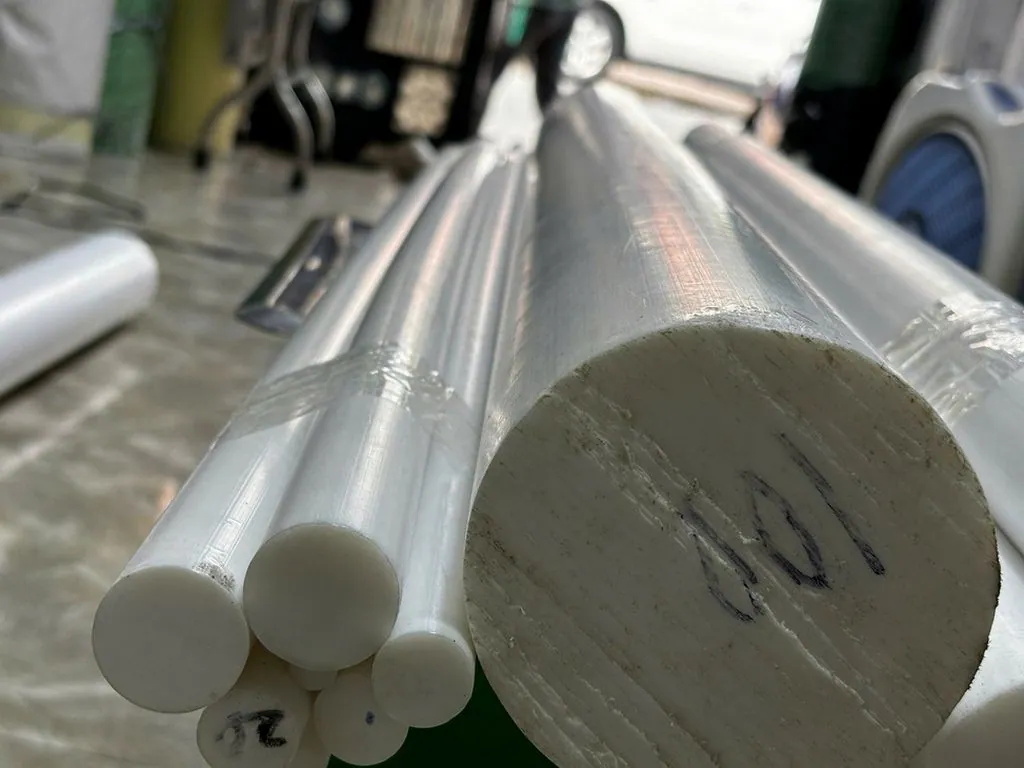 Nhựa Teflon PTFE cây tròn đặc phi 155 mm — phi 100 Nhựa Teflon PTFE cây tròn đặc phi 155 mm — phi 100